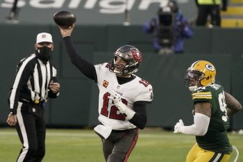 Green Bay Packers' Preston Smith watches as Tampa Bay Buccaneers quarterback Tom Brady throws a pass during the second half of the NFC championship NFL football game in Green Bay, Wis., Sunday, Jan. 24, 2021. (AP Photo/Morry Gash)